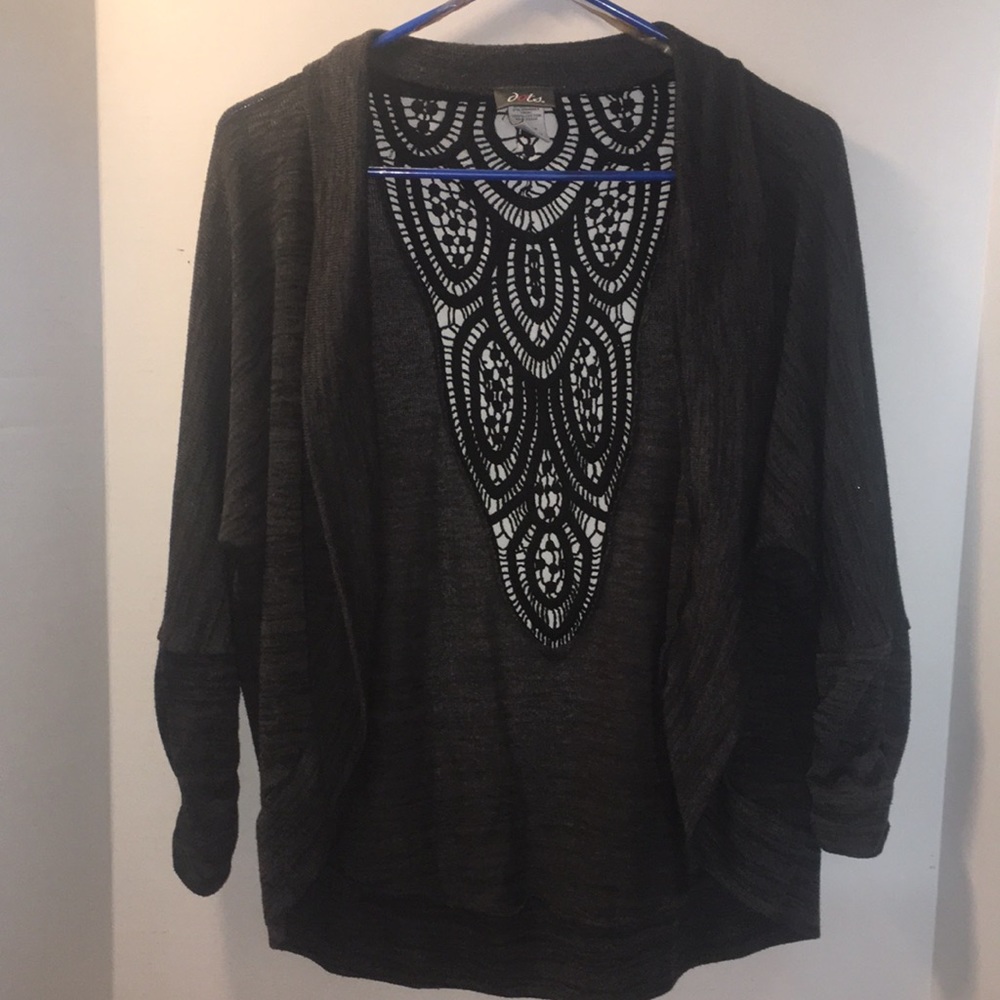 DOTS OPEN FRONT SHRUG WITH GATHERED WRISTS AND LACE DESIGN ON BACK SIZE L.